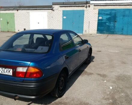 Синій Мазда 323, об'ємом двигуна 1.5 л та пробігом 250 тис. км за 2100 $, фото 1 на Automoto.ua