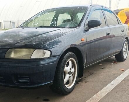 Синий Мазда 323, объемом двигателя 1.5 л и пробегом 420 тыс. км за 1300 $, фото 1 на Automoto.ua