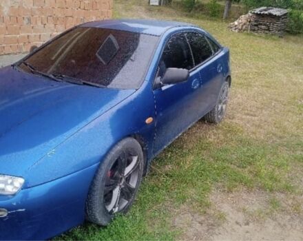 Синий Мазда 323, объемом двигателя 0 л и пробегом 200 тыс. км за 1003 $, фото 1 на Automoto.ua