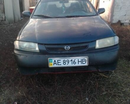 Синий Мазда 323, объемом двигателя 1.5 л и пробегом 387 тыс. км за 1354 $, фото 1 на Automoto.ua