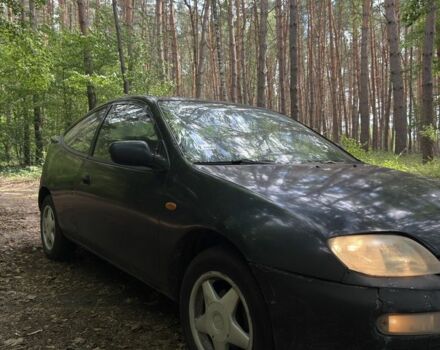 Синій Мазда 323, об'ємом двигуна 1.5 л та пробігом 369 тис. км за 1100 $, фото 1 на Automoto.ua