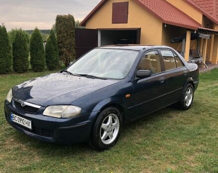 Синий Мазда 323, объемом двигателя 1.32 л и пробегом 346 тыс. км за 2300 $, фото 1 на Automoto.ua
