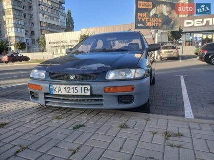 Синий Мазда 323, объемом двигателя 1.49 л и пробегом 440 тыс. км за 1700 $, фото 1 на Automoto.ua