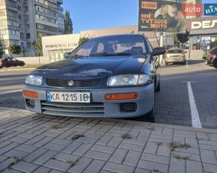 Синий Мазда 323, объемом двигателя 1.49 л и пробегом 440 тыс. км за 1700 $, фото 1 на Automoto.ua