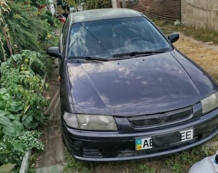 Синий Мазда 323, объемом двигателя 1.5 л и пробегом 400 тыс. км за 2574 $, фото 1 на Automoto.ua