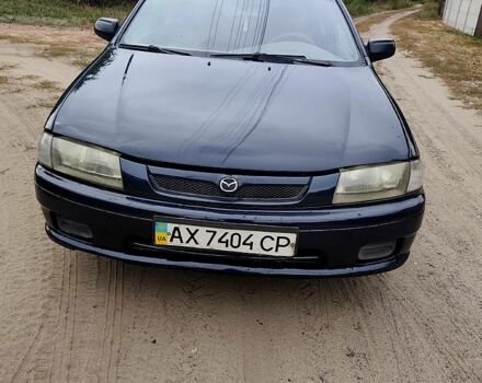 Синий Мазда 323, объемом двигателя 1.5 л и пробегом 285 тыс. км за 2500 $, фото 1 на Automoto.ua