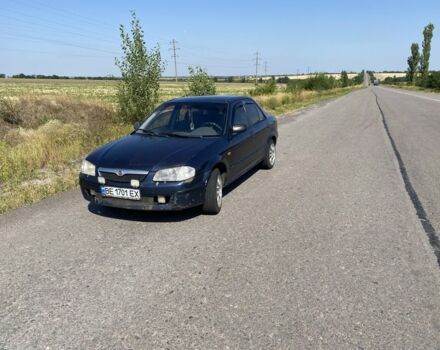 Синій Мазда 323, об'ємом двигуна 1.5 л та пробігом 40 тис. км за 1601 $, фото 1 на Automoto.ua