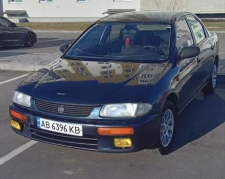 Синій Мазда 323, об'ємом двигуна 1.5 л та пробігом 272 тис. км за 1400 $, фото 1 на Automoto.ua