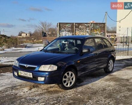 Синий Мазда 323, объемом двигателя 1.5 л и пробегом 200 тыс. км за 3250 $, фото 1 на Automoto.ua