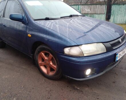 Синий Мазда 323, объемом двигателя 1.3 л и пробегом 400 тыс. км за 1800 $, фото 1 на Automoto.ua
