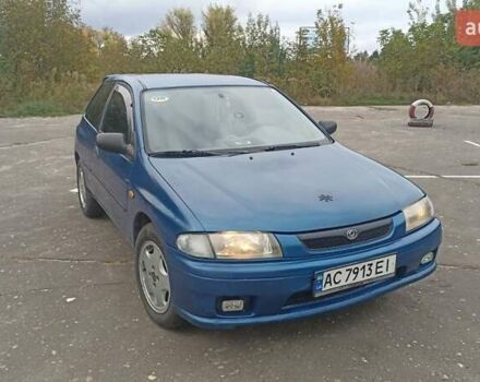 Синий Мазда 323, объемом двигателя 1.32 л и пробегом 235 тыс. км за 2650 $, фото 1 на Automoto.ua