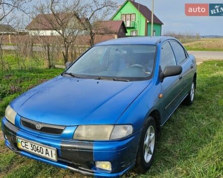 Синий Мазда 323, объемом двигателя 1.5 л и пробегом 288 тыс. км за 2300 $, фото 1 на Automoto.ua