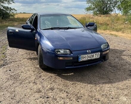 Синий Мазда 323, объемом двигателя 1.5 л и пробегом 281 тыс. км за 2500 $, фото 1 на Automoto.ua