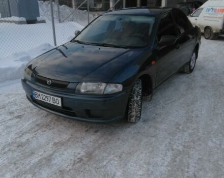 Синий Мазда 323, объемом двигателя 1.5 л и пробегом 270 тыс. км за 3600 $, фото 1 на Automoto.ua
