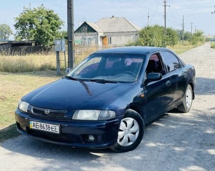 Синій Мазда 323, об'ємом двигуна 1.5 л та пробігом 200 тис. км за 1900 $, фото 1 на Automoto.ua