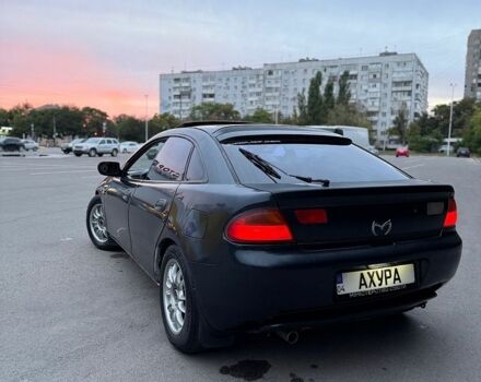 Синий Мазда 323, объемом двигателя 1.5 л и пробегом 370 тыс. км за 2700 $, фото 1 на Automoto.ua
