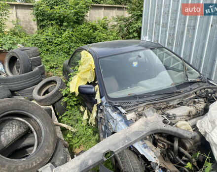 Синій Мазда 323, об'ємом двигуна 1.84 л та пробігом 300 тис. км за 500 $, фото 1 на Automoto.ua