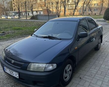 Синий Мазда 323, объемом двигателя 0 л и пробегом 245 тыс. км за 800 $, фото 1 на Automoto.ua