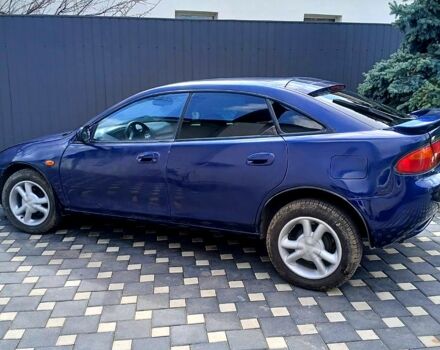 Синій Мазда 323, об'ємом двигуна 1.5 л та пробігом 300 тис. км за 2500 $, фото 1 на Automoto.ua