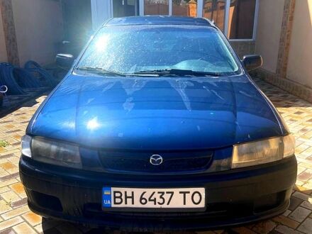 Синій Мазда 323, об'ємом двигуна 1.5 л та пробігом 396 тис. км за 2200 $, фото 1 на Automoto.ua