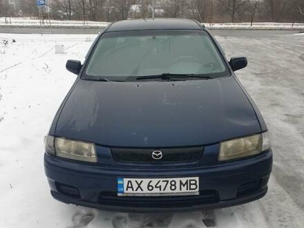 Синий Мазда 323, объемом двигателя 1.84 л и пробегом 299 тыс. км за 2000 $, фото 1 на Automoto.ua