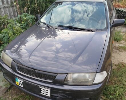 Синий Мазда 323, объемом двигателя 0 л и пробегом 300 тыс. км за 1241 $, фото 1 на Automoto.ua