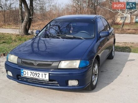 Синий Мазда 323, объемом двигателя 1.49 л и пробегом 785 тыс. км за 2100 $, фото 1 на Automoto.ua