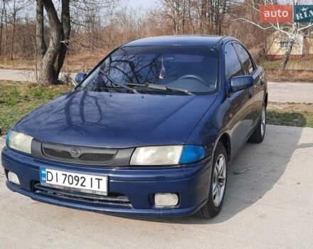 Синій Мазда 323, об'ємом двигуна 1.49 л та пробігом 785 тис. км за 2100 $, фото 1 на Automoto.ua