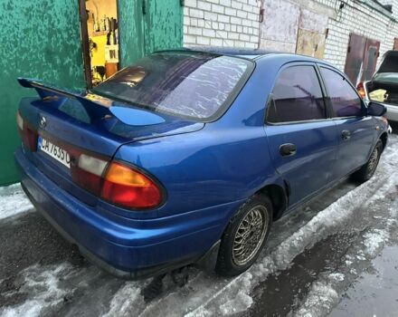Синий Мазда 323, объемом двигателя 1.5 л и пробегом 1 тыс. км за 550 $, фото 1 на Automoto.ua