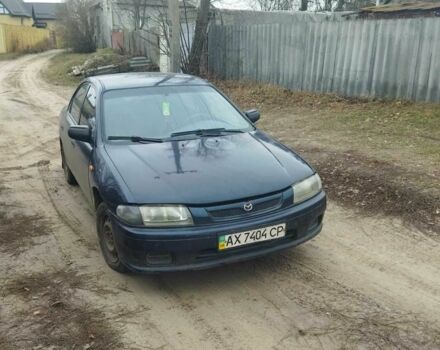 Синій Мазда 323, об'ємом двигуна 1.5 л та пробігом 283 тис. км за 2050 $, фото 1 на Automoto.ua