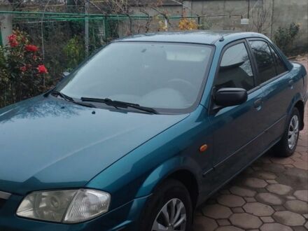 Синий Мазда 323, объемом двигателя 1.5 л и пробегом 280 тыс. км за 2700 $, фото 1 на Automoto.ua