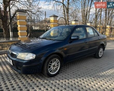 Синий Мазда 323, объемом двигателя 2 л и пробегом 310 тыс. км за 2000 $, фото 1 на Automoto.ua