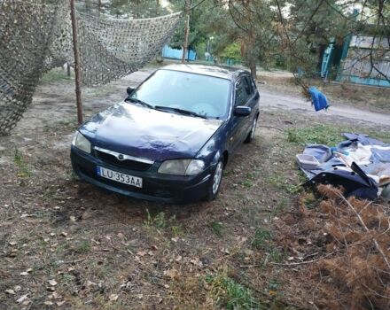 Синий Мазда 323, объемом двигателя 0 л и пробегом 400 тыс. км за 750 $, фото 1 на Automoto.ua
