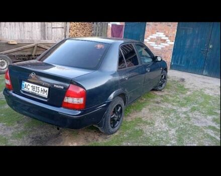 Синий Мазда 323, объемом двигателя 1.8 л и пробегом 257 тыс. км за 700 $, фото 1 на Automoto.ua