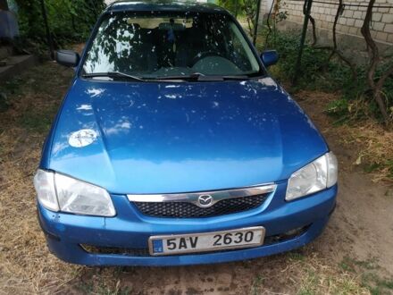 Синий Мазда 323, объемом двигателя 1.5 л и пробегом 3 тыс. км за 618 $, фото 1 на Automoto.ua