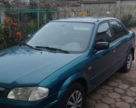 Синий Мазда 323, объемом двигателя 1.5 л и пробегом 280 тыс. км за 2700 $, фото 1 на Automoto.ua