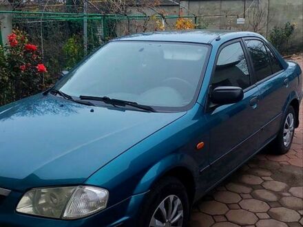 Синий Мазда 323, объемом двигателя 1.5 л и пробегом 280 тыс. км за 2700 $, фото 1 на Automoto.ua