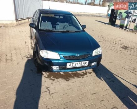 Синий Мазда 323, объемом двигателя 1.5 л и пробегом 230 тыс. км за 1650 $, фото 1 на Automoto.ua