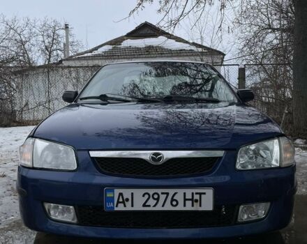 Синій Мазда 323, об'ємом двигуна 2 л та пробігом 390 тис. км за 3500 $, фото 1 на Automoto.ua