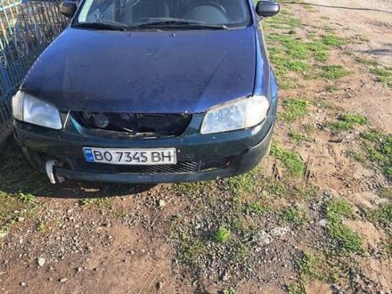 Синій Мазда 323, об'ємом двигуна 1.6 л та пробігом 223 тис. км за 1100 $, фото 1 на Automoto.ua