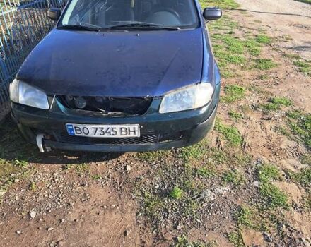 Синій Мазда 323, об'ємом двигуна 1.6 л та пробігом 223 тис. км за 1100 $, фото 1 на Automoto.ua