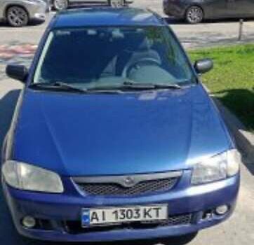 Синій Мазда 323, об'ємом двигуна 1.5 л та пробігом 410 тис. км за 2500 $, фото 1 на Automoto.ua