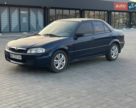 Синий Мазда 323, объемом двигателя 1.6 л и пробегом 237 тыс. км за 2700 $, фото 1 на Automoto.ua
