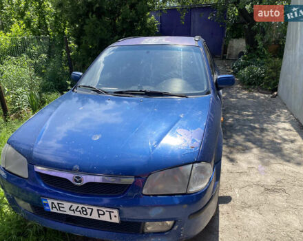 Синий Мазда 323, объемом двигателя 1.5 л и пробегом 370 тыс. км за 1700 $, фото 1 на Automoto.ua