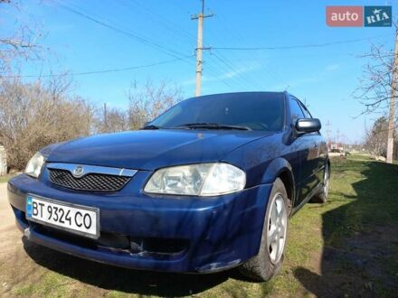 Синий Мазда 323, объемом двигателя 1.6 л и пробегом 298 тыс. км за 2999 $, фото 1 на Automoto.ua