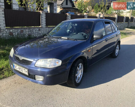 Синий Мазда 323, объемом двигателя 1.32 л и пробегом 300 тыс. км за 2000 $, фото 1 на Automoto.ua