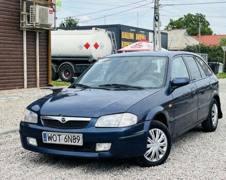 Синій Мазда 323, об'ємом двигуна 2 л та пробігом 333 тис. км за 1650 $, фото 1 на Automoto.ua