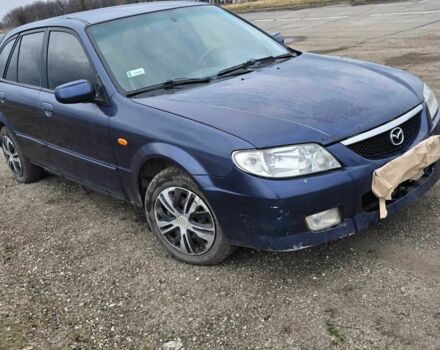 Синий Мазда 323, объемом двигателя 0 л и пробегом 330 тыс. км за 1000 $, фото 1 на Automoto.ua