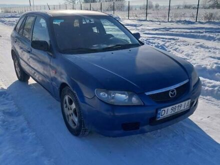 Синій Мазда 323, об'ємом двигуна 1.32 л та пробігом 250 тис. км за 1700 $, фото 1 на Automoto.ua