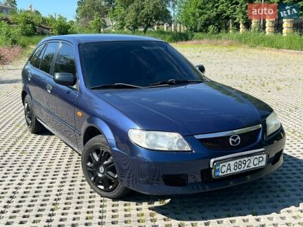 Синий Мазда 323, объемом двигателя 1.99 л и пробегом 288 тыс. км за 2499 $, фото 1 на Automoto.ua